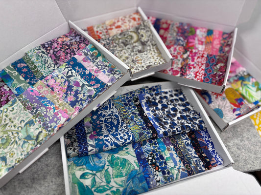 Liberty Tana Lawn colour-themed scrap boxes with hexie templates and backing fabric