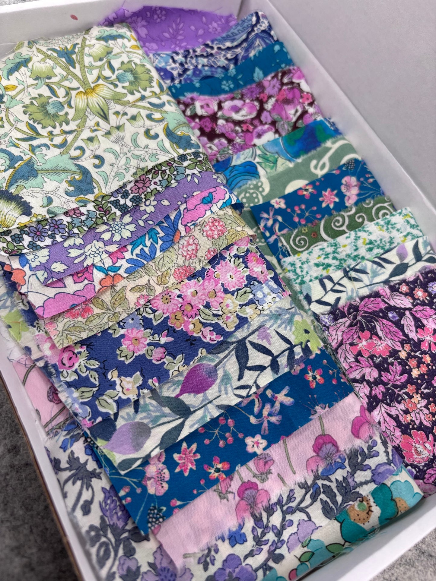 Liberty Tana Lawn colour-themed scrap boxes with hexie templates and backing fabric