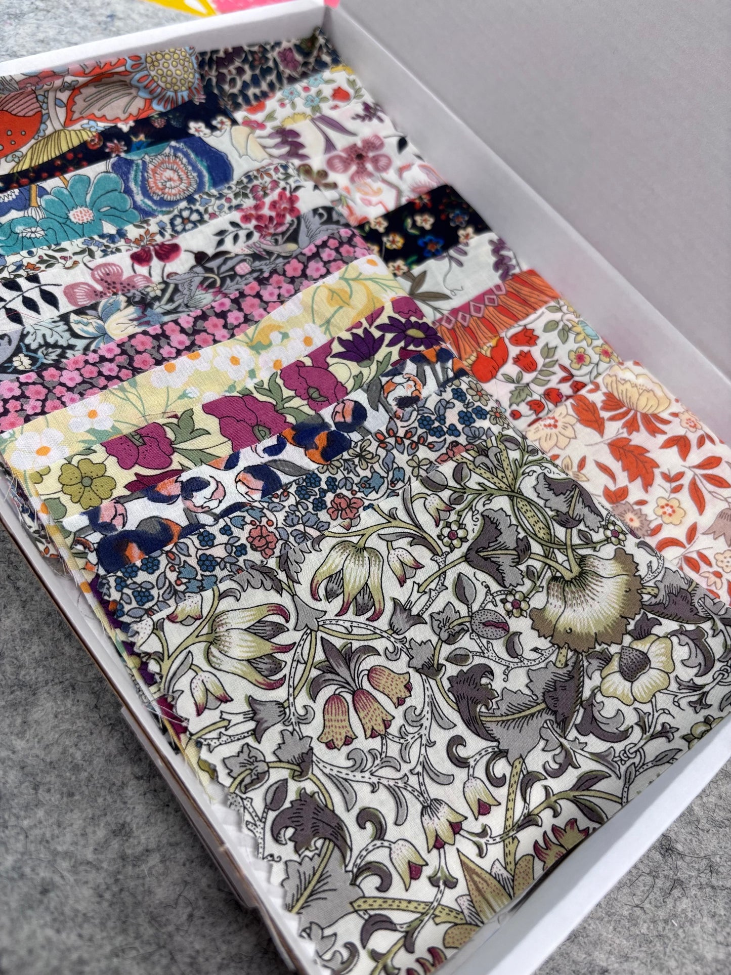 Liberty Tana Lawn colour-themed scrap boxes with hexie templates and backing fabric