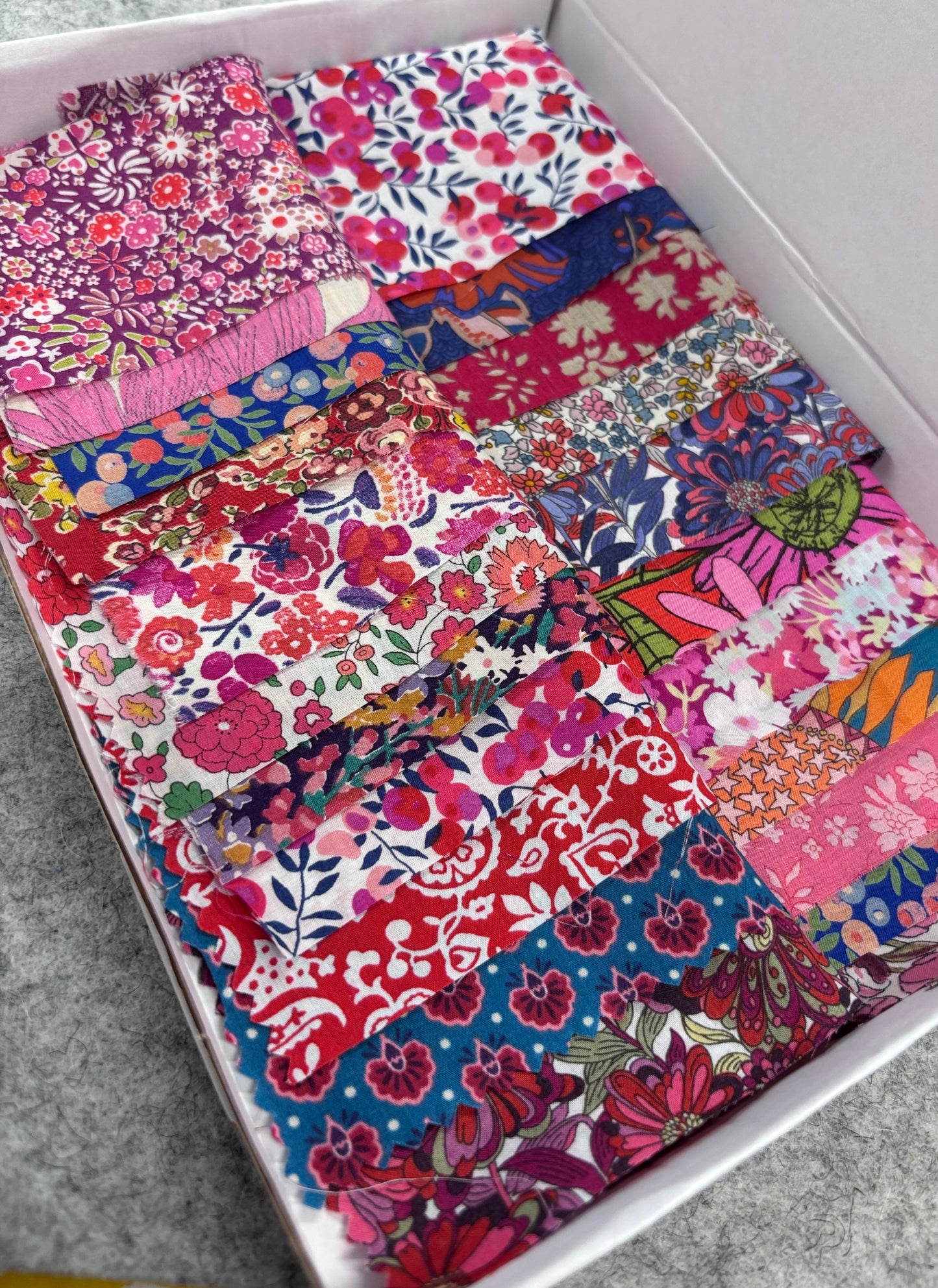 Liberty Tana Lawn colour-themed scrap boxes with hexie templates and backing fabric