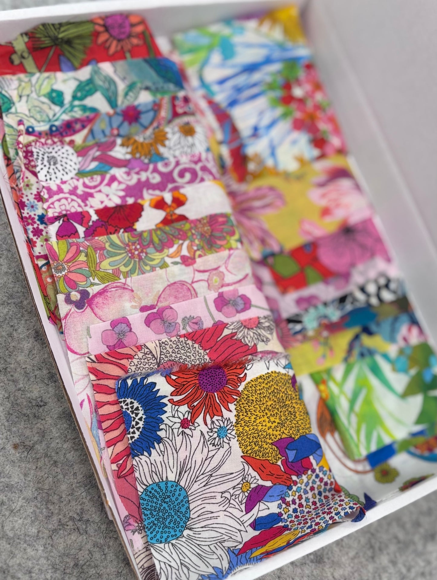 Liberty Tana Lawn colour-themed scrap boxes with hexie templates and backing fabric