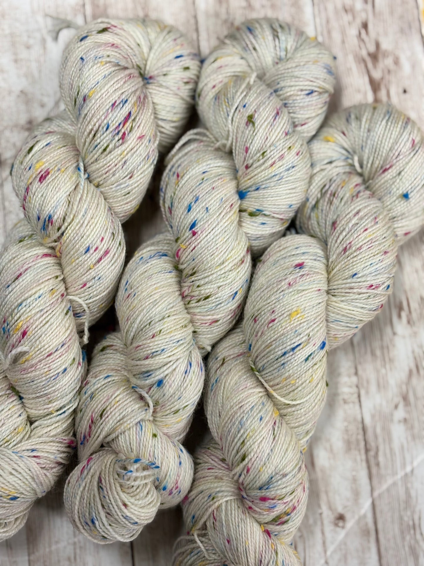 Locket's Hand Dyed 4ply Merino with multi coloured neps