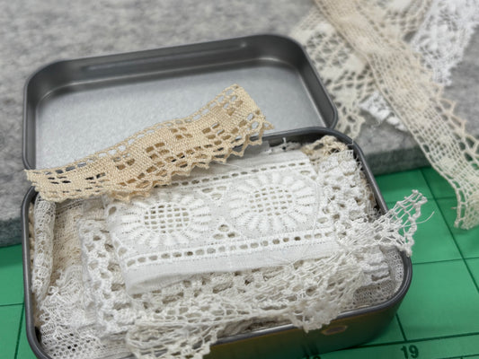 Little tin of vintage lace trims